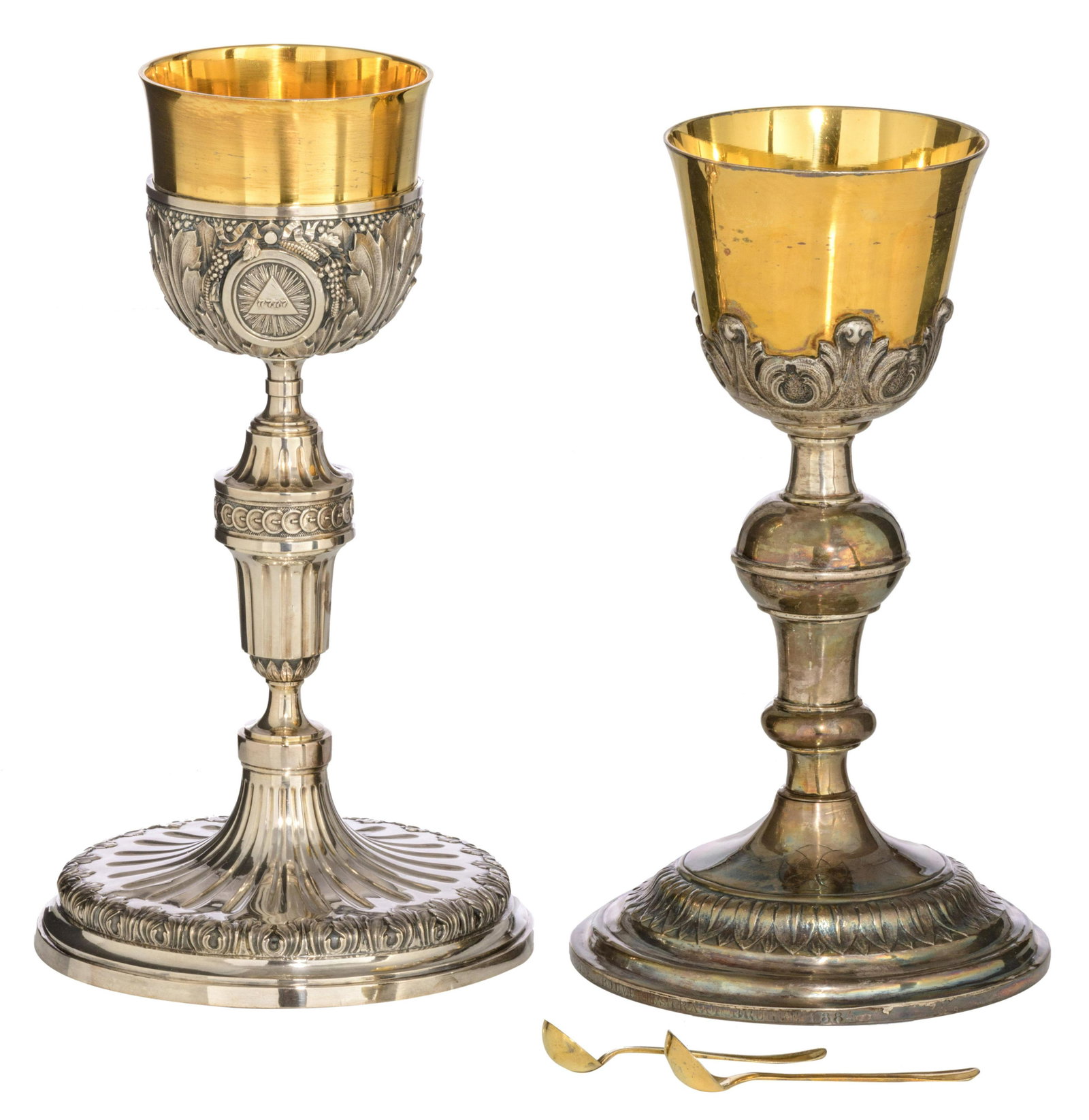 Two 19thC neoclassical relief decorated silver and gilt: Two 19thC neoclassical relief decorated silver and gilt silver chalices: one weighing c. 612 g - H 28 cm, and with a matching spoon - one with owner's engraving 'Eerw. Paters Capucynen - Boeveriestraa