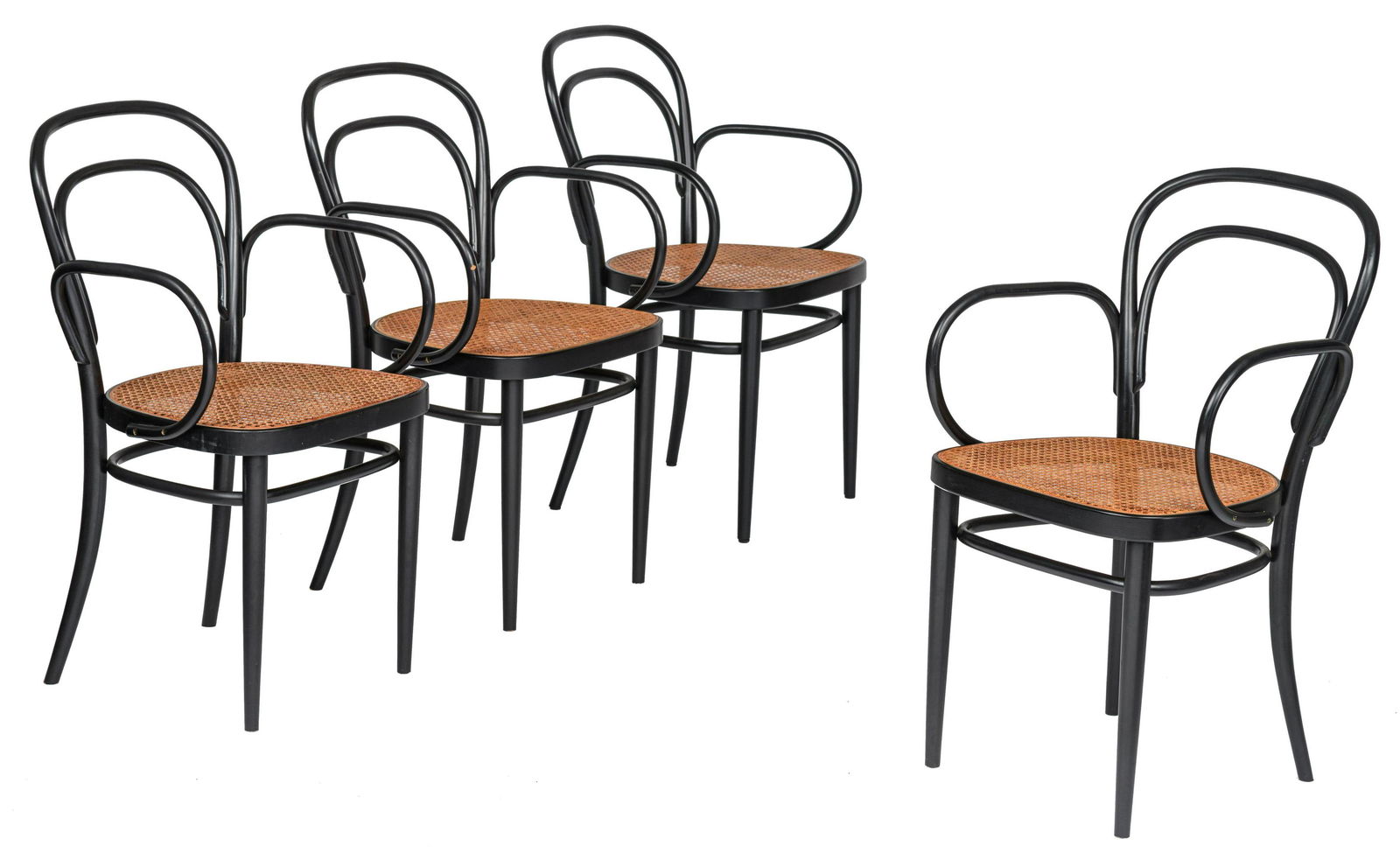 A set of four black bentwood 'NÂ° 14' Thonet armchairs,: A set of four black bentwood 'NÂ° 14' Thonet armchairs, with woven cane seatings, design by Michael Thonet for Ton (Czech Republic), H 46-84,5 - W 53 - D 52 cm