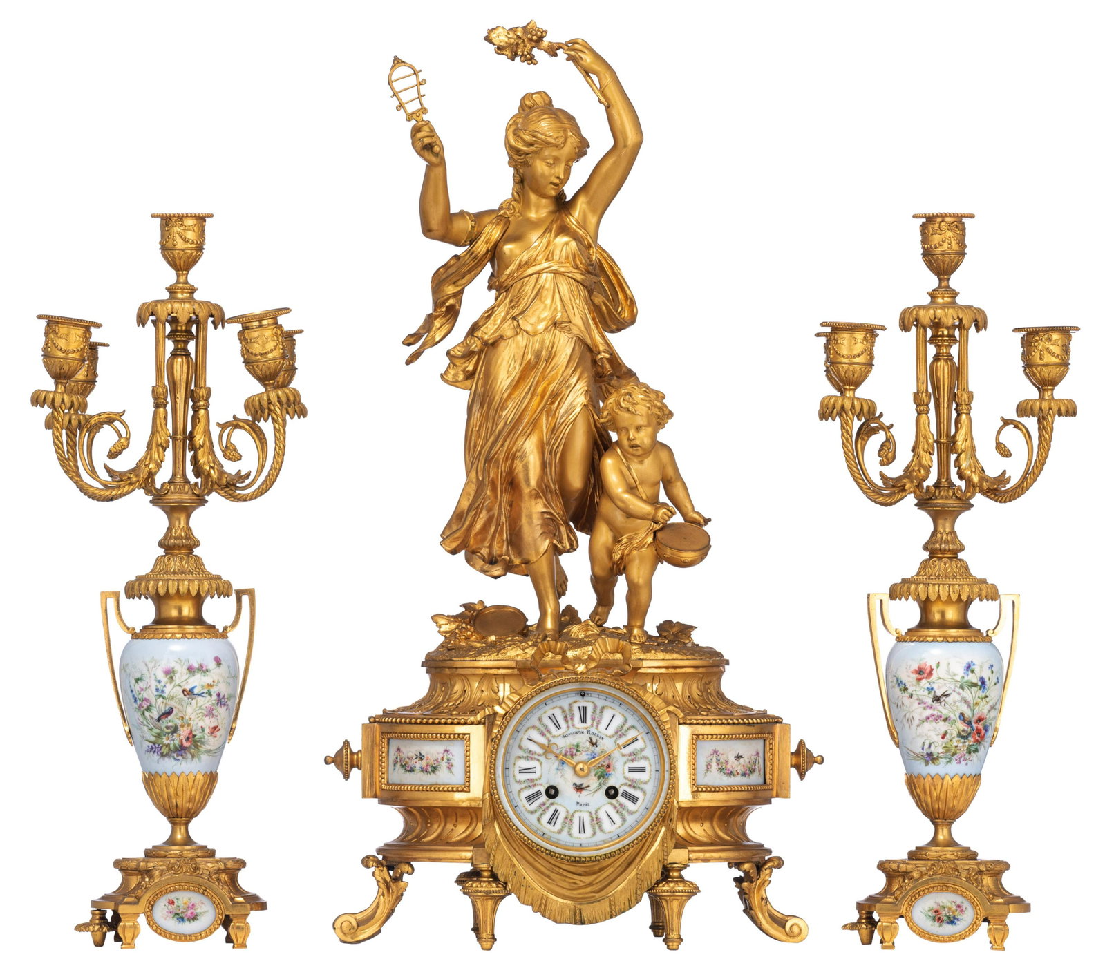 A fine Neoclassical three-piece clock garniture, ormolu: A fine Neoclassical three-piece clock garniture, ormolu bronze and hand-painted soft-porcelain plaques depicting flower bunches and birds, the clock decorated with a bacchanal scene on top, flanked by