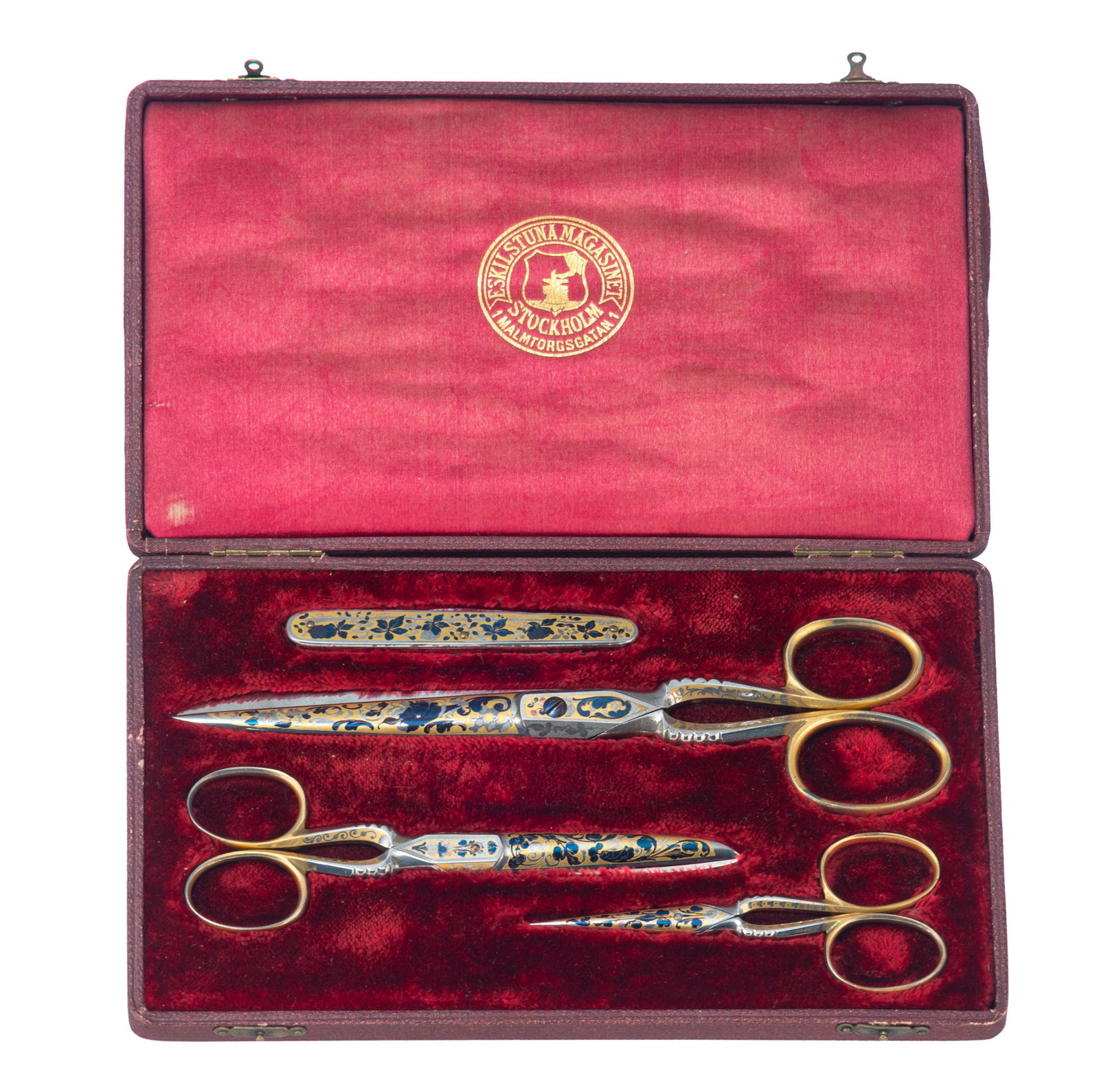 A set of floral damascening scissors and pocket knife,: A set of floral damascening scissors and pocket knife, by 'Eskilstunamagasinet, Stockholm' A set of floral damascening decorated scissors and pocket knife, by 'Eskilstunamagasinet, Stockholm', gilt, s