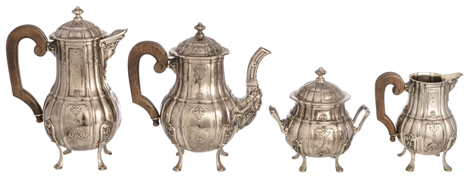 A four-part Belgian silver coffee and tea set, H 15 -: A four-part Belgian silver coffee and tea set, H 15 - 29 cm / total weight c. 4.290 g 20thC, French LXIV / RÃ©gence style inspired, walnut handles, maker's mark G.A.D., 800/000 purity, coffee pot H 