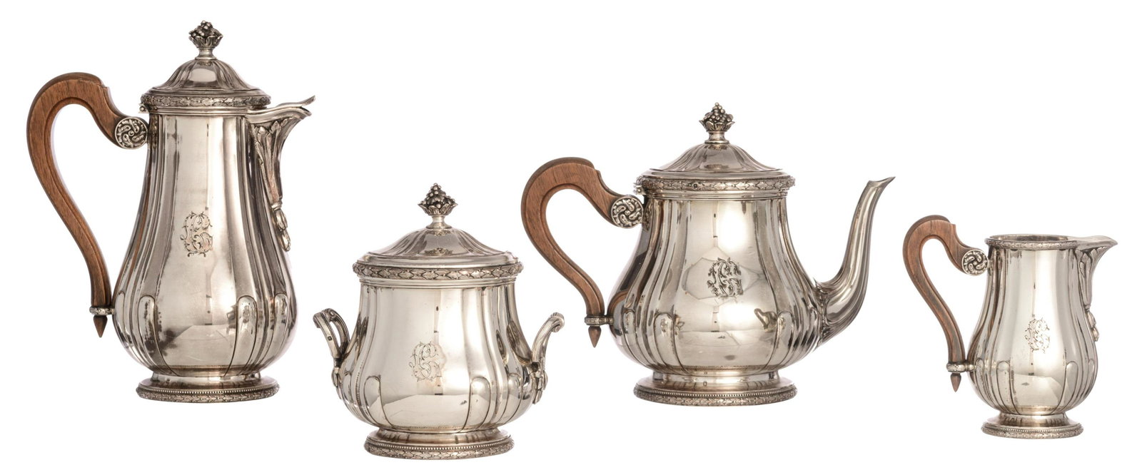 A four-part late 19th - early 20thC French silver: A four-part late 19th - early 20thC French silver coffee and tea-set, H 13 - 24 cm / total weight c. 2.450 g Consisting of a coffee pot, weight 806 g. a teapot, weight 808 g. a sugar bowl, weight 564 