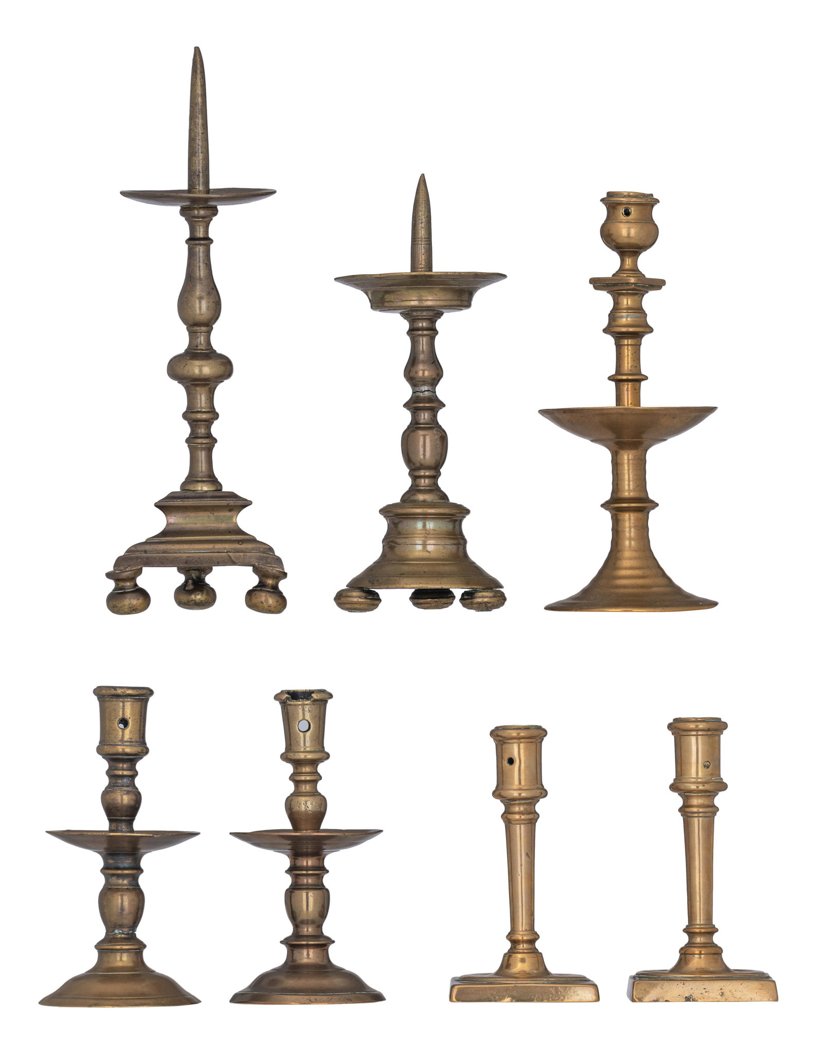 A collection of 7 brass candlesticks, H 16,5 - 34,5: A collection of 7 brass candlesticks, H 16,5 - 34,5 cm - An Italian Renaissance brass pricket candlestick, 16th/17thC, 34,5 cm - A Baroque pricket candlestick, the Southern Netherlands, 17thC, H 26,5 