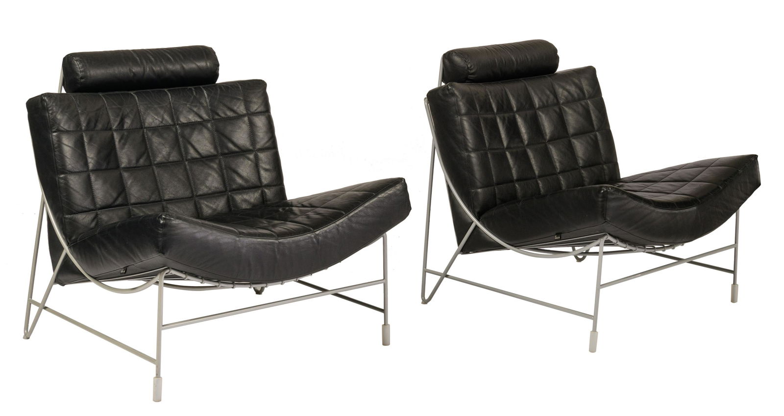 A pair of black leather 'Volare' chairs, designed by: A pair of black leather 'Volare' chairs, designed by Jan Armgardt for Leolux, the Netherlands, 1998, H 81 - W 83 cmWith a label of 'LEOLUX'.