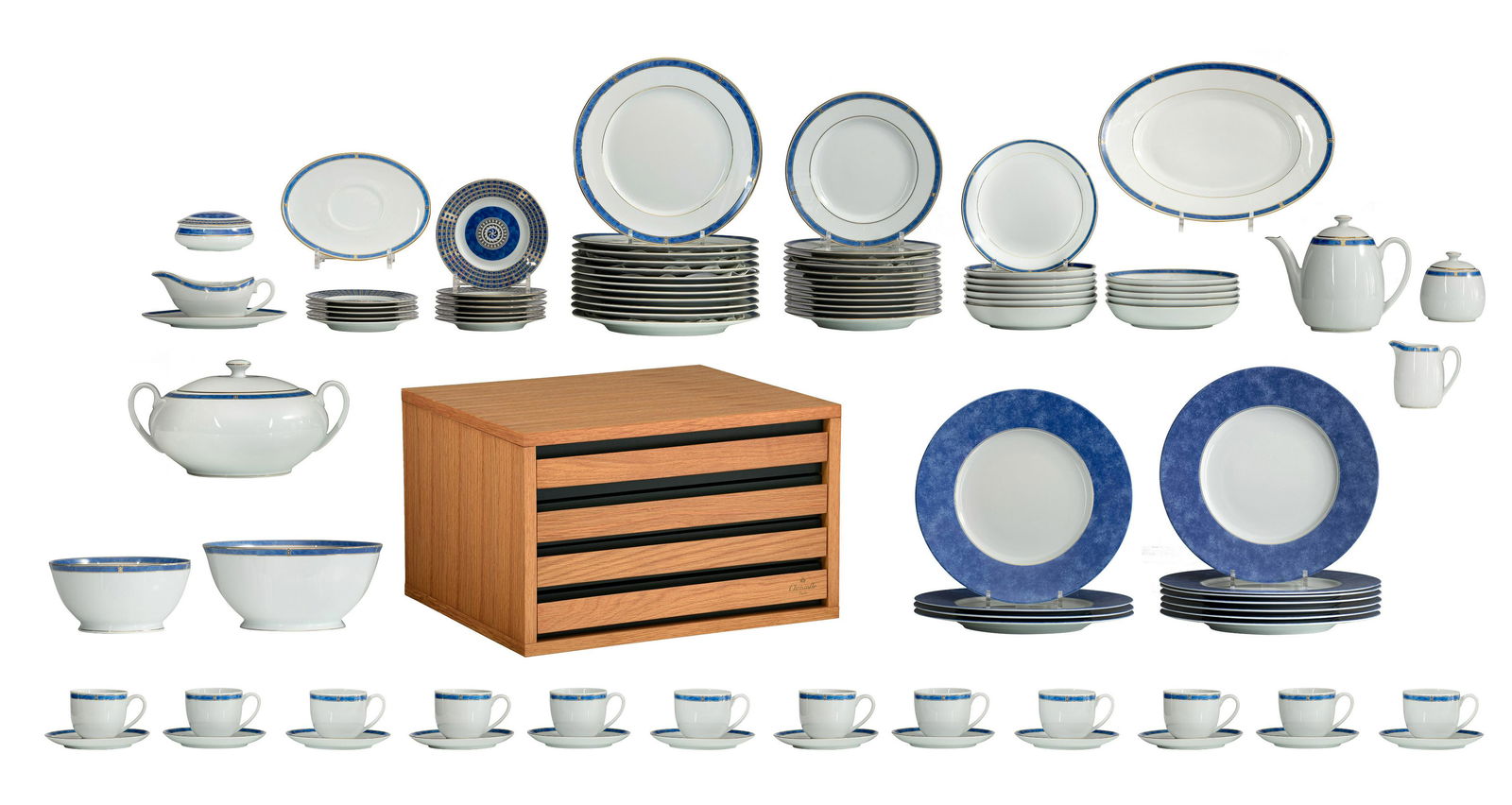 A large silver-plated flatware and 'Oceana Blue': A large silver-plated flatware and 'Oceana Blue' porcelain tableware by ChristofleThe flatware in total 128 pieces, presented in the original box, H 29,5 - W 47 - D 39,5 cmThe porcelain tableware in t