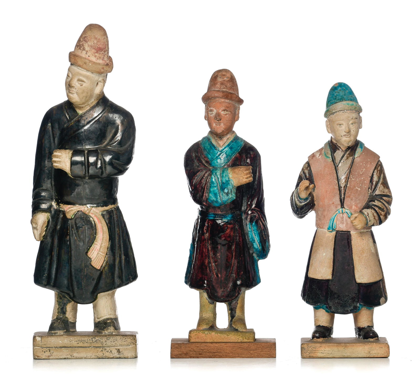 A collection of Chinese fahua or sancai glazed pottery figures, Ming dynasty, tallest H 33,5 cm (+) (1 of 8)