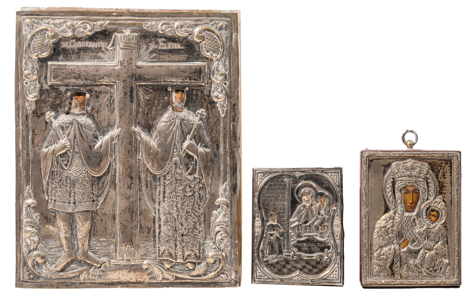 An Eastern European icon with silver oklad and two ditto travel icons, 19thC, 9 x 11 - 21 x 25,5 cm (1 of 6)