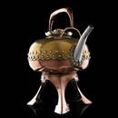 A Japanese inspired yellow and red copper tea kettle and stand, with a silver-plated mount and