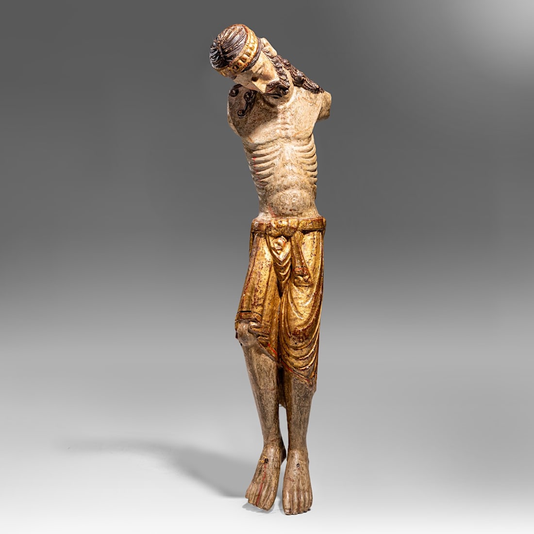 A rare 13th/14thC polychrome and gilt walnut Corpus Christi, presumingly Spanish, H 120 cm (1 of 9)