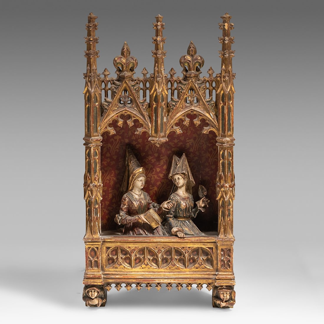 A finely sculpted polychrome and gilt wooden Gothic Revival shrine with a medieval court scene, H 80 (1 of 8)