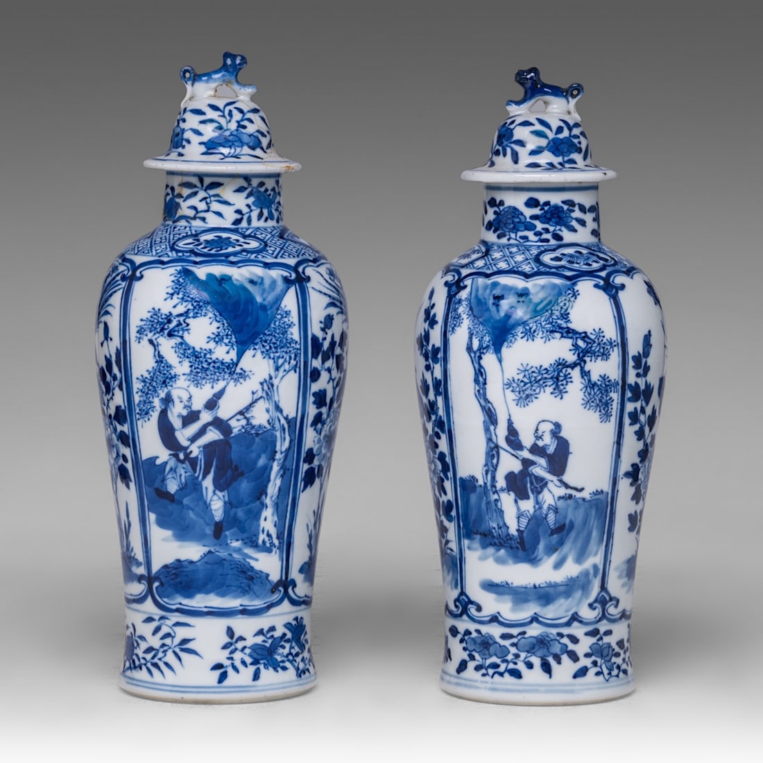 A near pair of Chinese blue and white 'Li Tieguai' lidded vases, with a Kangxi mark, 19thC, Total H (1 of 8)