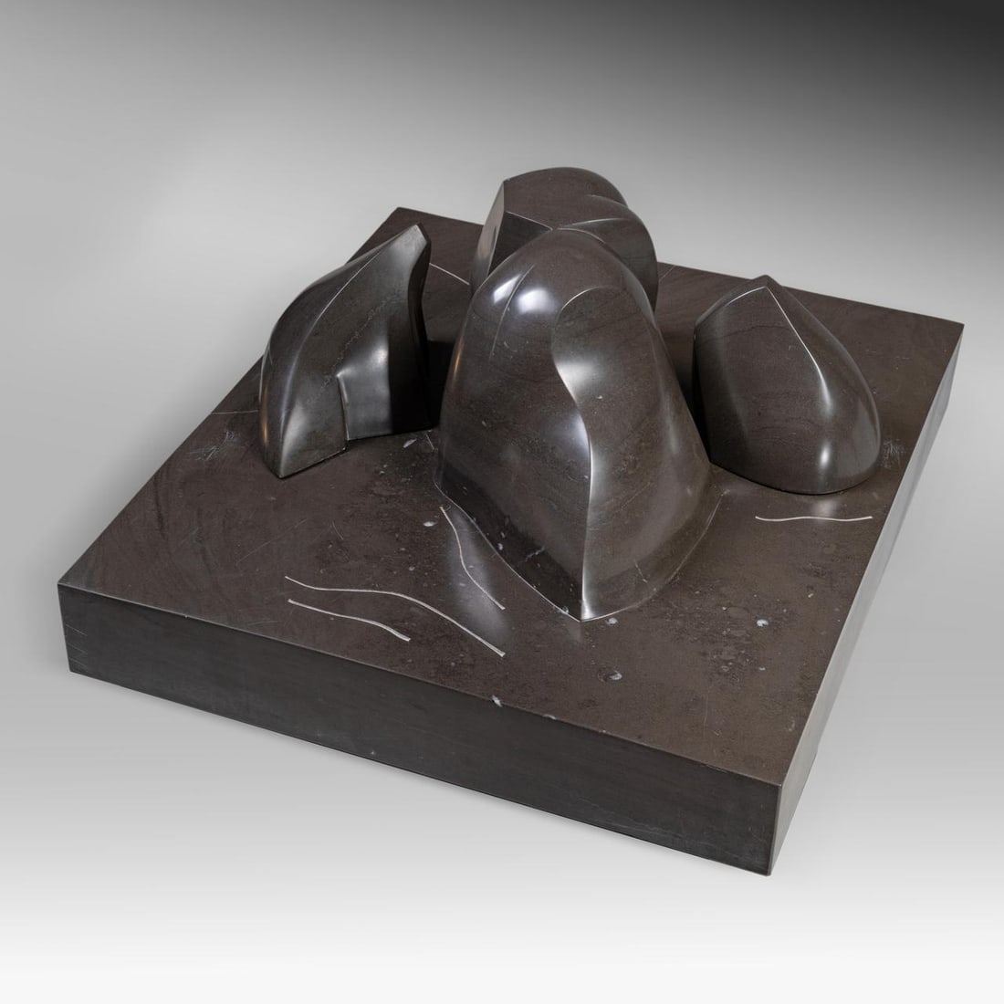 Pol Spilliaert (1935-2023), 'Na de storm', Vinalmont Meuse Blue Stone, 1986 (+) 65 x 58 x 30 cm.: Pol Spilliaert (1935-2023), 'Na de storm', Vinalmont Meuse Blue Stone, 1986 (+)Illustrated in the monography:Jaak Fontier, 'Pol Spilliaert', Drukkerij Lannoo NV, Tielt, 2005, p. 64Added: a framed penc