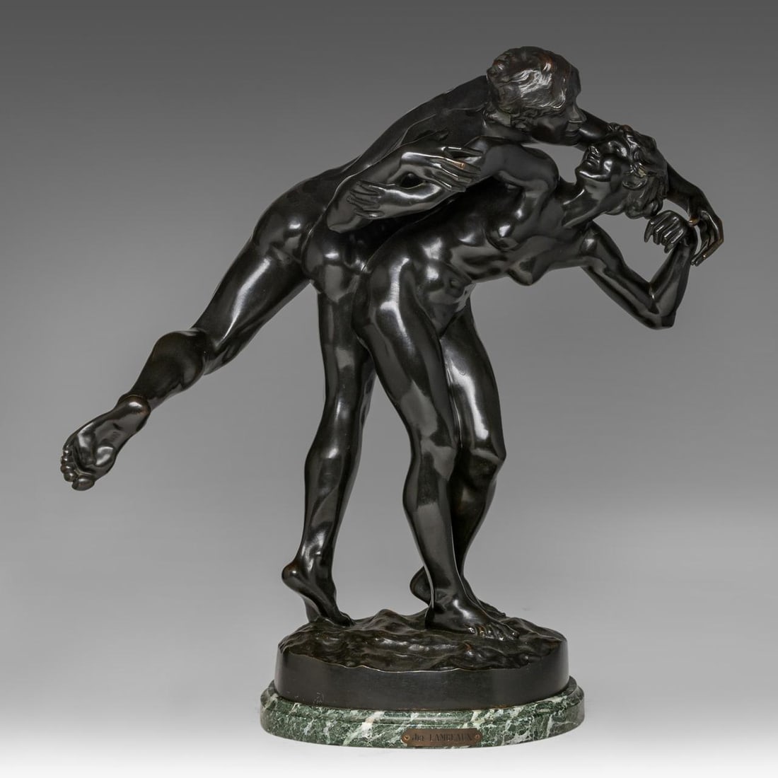 Jef Lambeaux (1852-1908), 'Le Baiser', dark patinated bronze, H 56 cm: Jef Lambeaux (1852-1908), 'Le Baiser', dark patinated bronze, H 56 cmSigned on the base.Presented on a 'vert de mer' marble base.