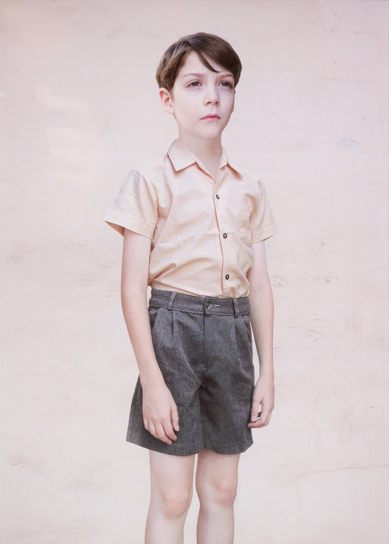 Loretta Lux (1969), 'The Boy', 2001, gelatin silver print, Ndeg 8/20 32 x 23 cm. (12.6 x 9.0 in.),: Loretta Lux (1969), 'The Boy', 2001, gelatin silver print, Ndeg 8/20Is possibly subject to the Artist's Resale Right / consult 'Conditions of Sale'32 x 23 cm. (12.6 x 9.0 in.), Frame: 54.5 x 44.5 cm.