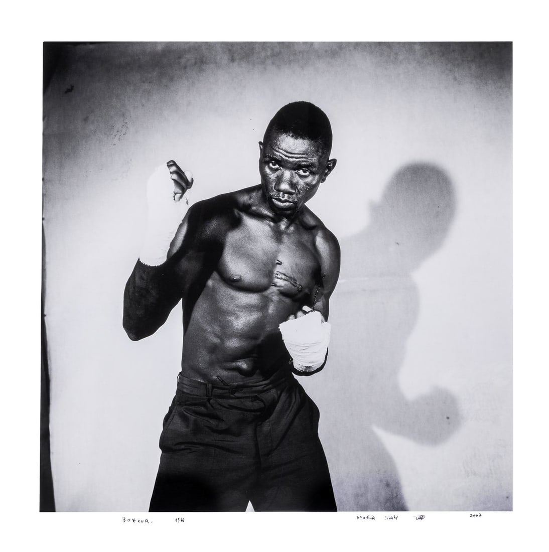 Malick Sidibe (1997), 'Boxeur, 1966', 2007, gelatin silver print on baryte paper, Ndeg 1/1 120 x 120: Malick Sidibe (1997), 'Boxeur, 1966', 2007, gelatin silver print on baryte paper, Ndeg 1/1Signed in felt pen.Is possibly subject to the Artist's Resale Right / consult 'Conditions of Sale'120 x 120 cm