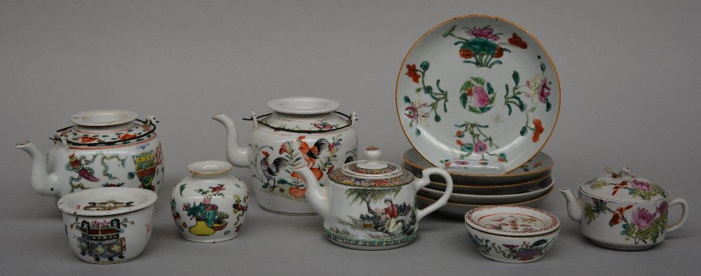 A Chinese polychrome tea set with four tea pots, seven (1 of 10)