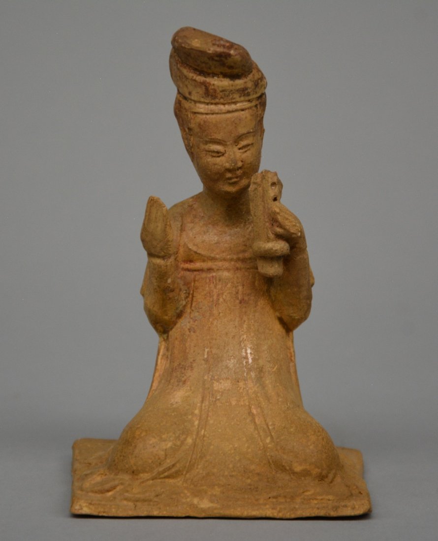 A Chinese earthenware funerary figure of a sitting lady (1 of 7)
