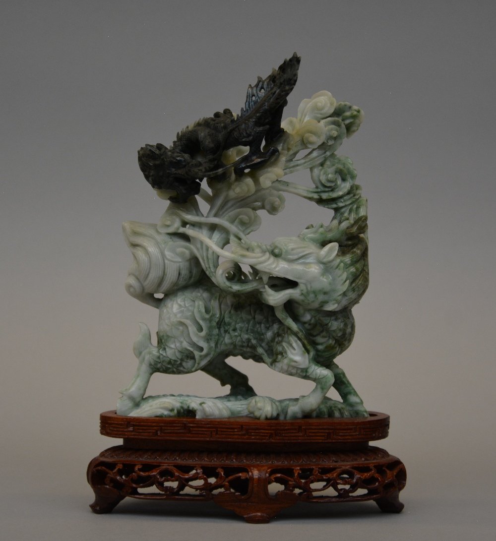 A beautifully carved Chinese jade sculpture depicting a (1 of 6)
