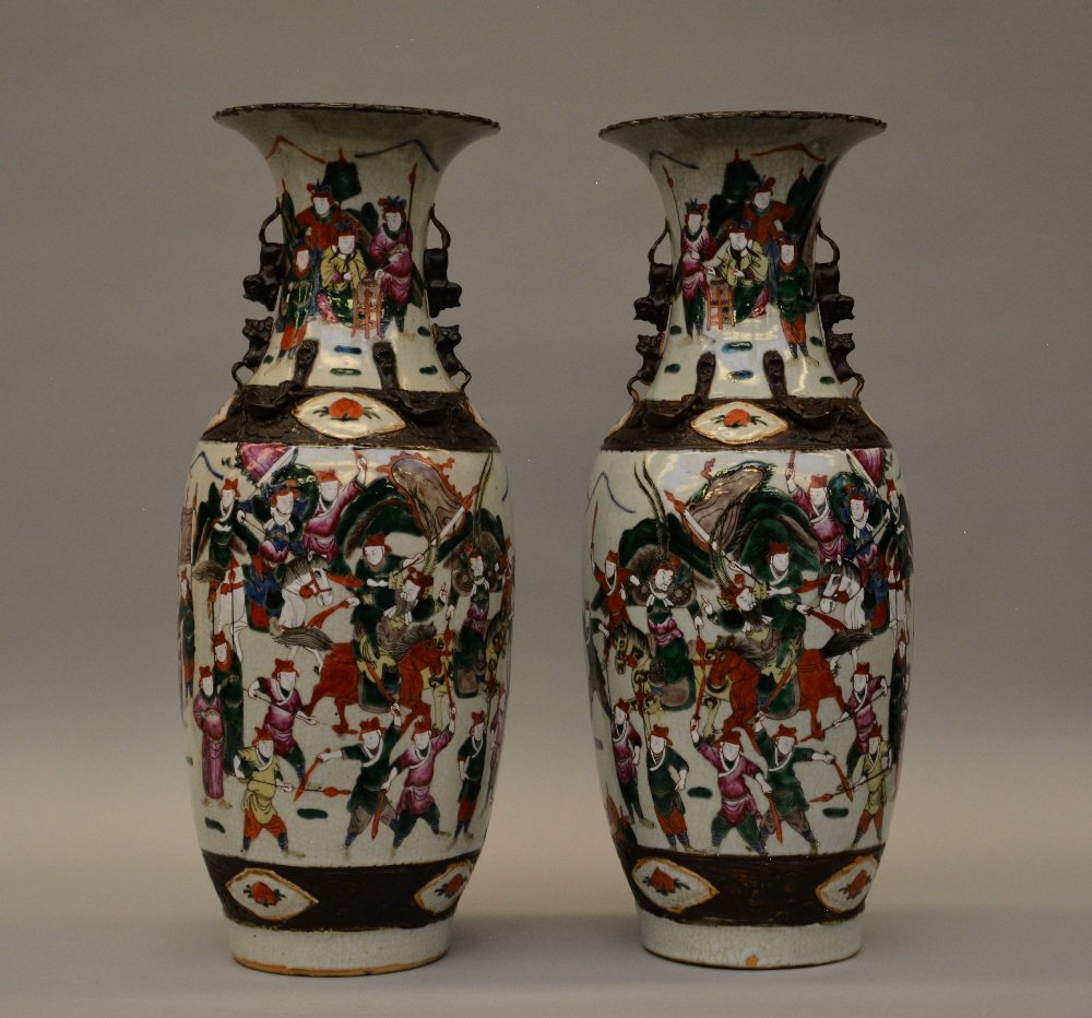 A pair of 19thC Chinese stoneware vases, painted with a (1 of 6)