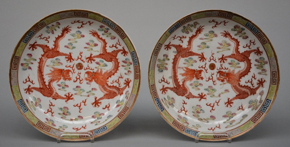 A pair of Chinese polychrome deep plates decorated with (1 of 3)