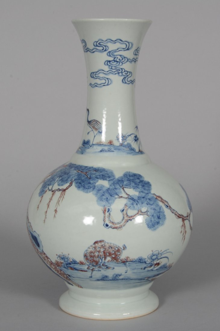 A Chinese blue and cupper red vase, decorated with a (1 of 7)