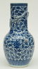 A Chinese blue and white and relief decorated vase, - 3
