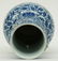 A Chinese blue and white and relief decorated vase, - 5