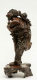 A Chinese walnut carved sculpture depicting a mythical - 2