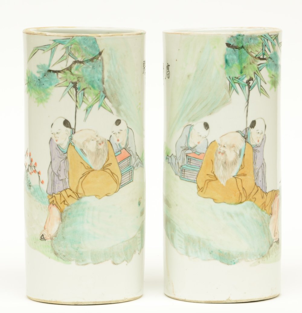 A pair of Chinese cylinder shaped polychrome vases, (1 of 7)