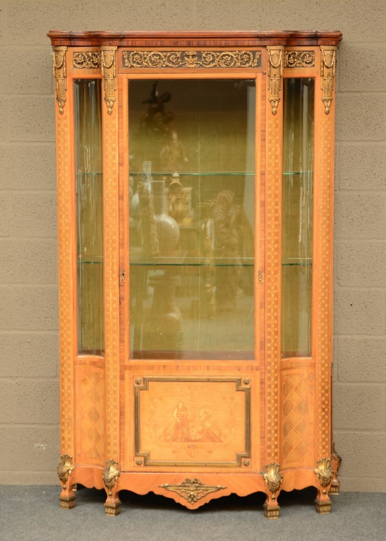 A charming Neoclassical display cabinet, mahogany: A charming Neoclassical display cabinet, mahogany veneerd and marquetry, bronze mounts, in the manner of De Coene - Courtrai, 1930s, H 190,5 - W 116,5 - D 47,5cm