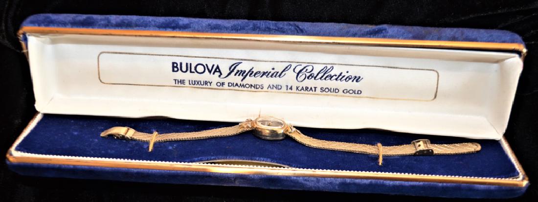 Bulova 14KY Gold Case Ladies Watch: Bulova E106 458822 case# 17 Jewel 100011 mechanism. 4 Rose Cut Diamond 1 pt. each. In excellent condition in original case.