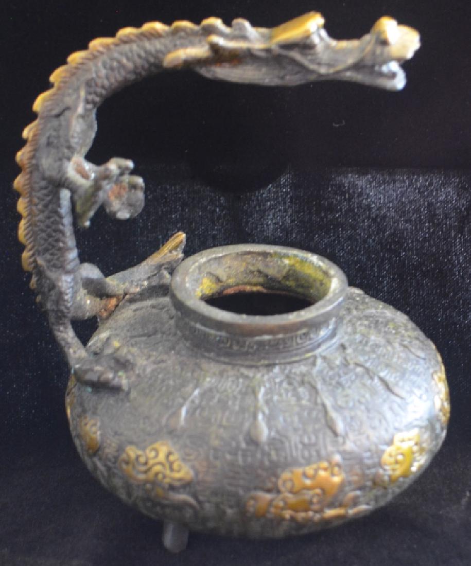 Bronze Chinese Dragon Incense Burner: Polished bronze. Well decorated incense burner. Stamped on bottom. This lot can be shipped domestically from