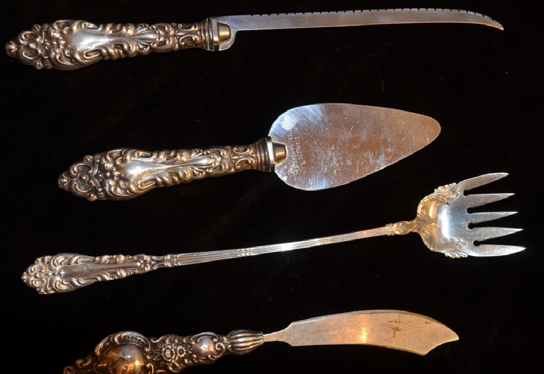 Set of Sterling Cutlery and Silverware: Three matching Sterling Handled set plus on Amston Sterling fork.