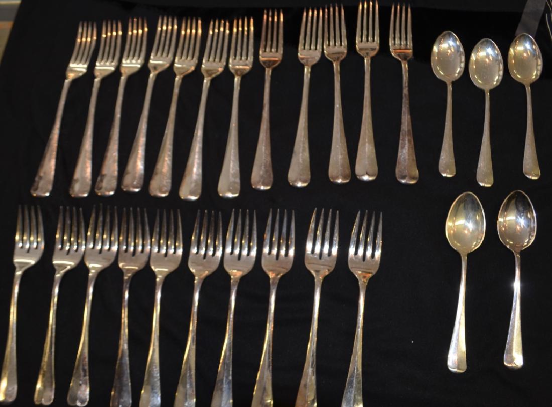 Large Lot of Cheltenham & Co. Silverware: Each marked Cheltenham & Co. Sheffield, EnglandLot includes 12 smaller forks10 larger forks5 Spoons.27 pieces total