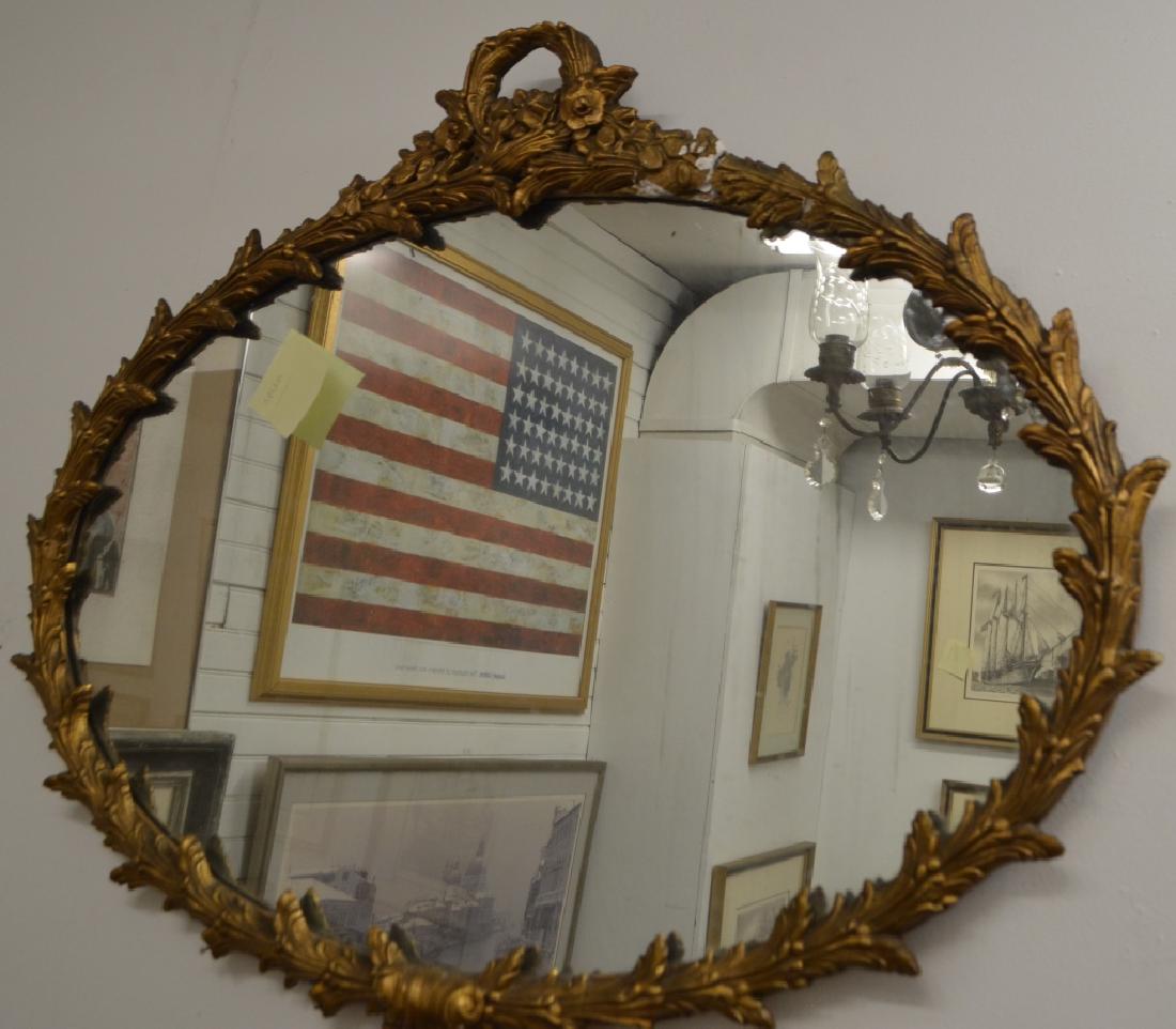 Antique Wall Mirror: 32" height x 39" width.Some damage to the upper portion of the frame. Please see all photos.