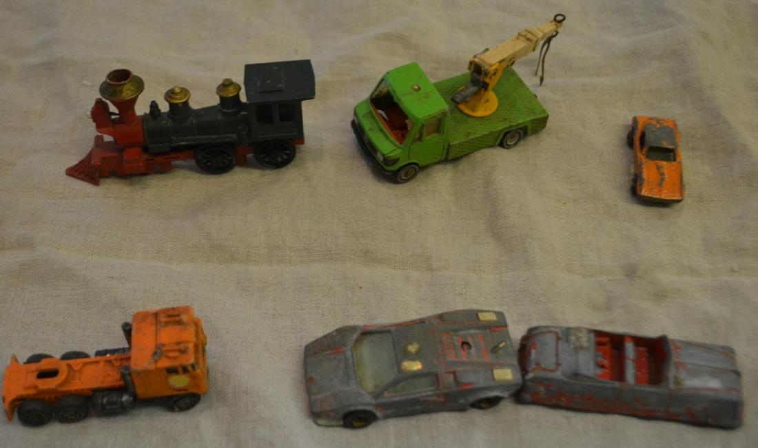 Lot of 6 Vintage Toy Cars: Lot includes aSiko Mercedes Utility Truck, made in Germany. Tootsie Convertible, made in USA. Majorette Lamborgini, Made in France. No makers mark found in the trian engine.