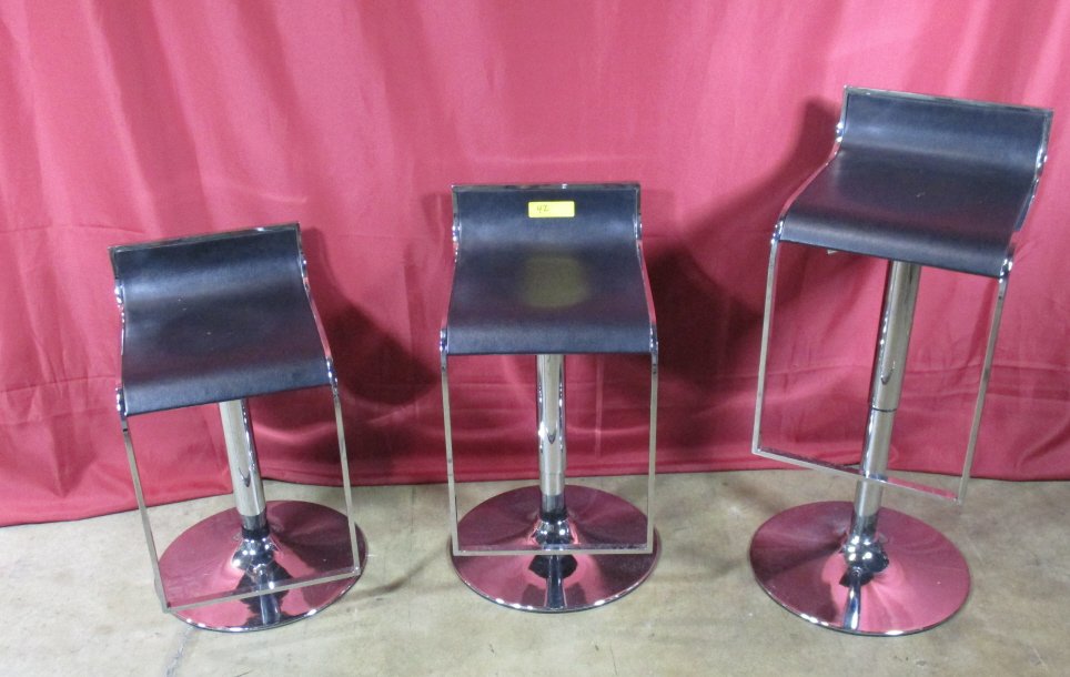 LOT CONSISTING OF (3) CHROME AND BLACK BAR STOOLS: MODERN, HEIGHT ADJUSTABLE *****FYI: It is the buyer responsibility to pick up or arrange to have items picked up by the allotted time and must supply their own handling equipment, supplies, trucking a