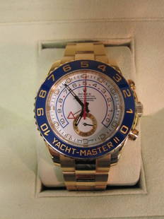 GENTLEMEN'S ROLEX YACHT-MASTER II, 18K GOLD: WATCH, 18K SOLID GOLD OYSTER BAND, COMES WITH ORIGINAL, ROLEX WARRANTY CARD, SERVICE MANUAL, WARRANTY BOOK, MODEL #116688; SERIAL #997K52H7 / PHOTO OF ORIGINAL RECEIPT ACCOMPANIES LOT DESCRIPTION (NOT