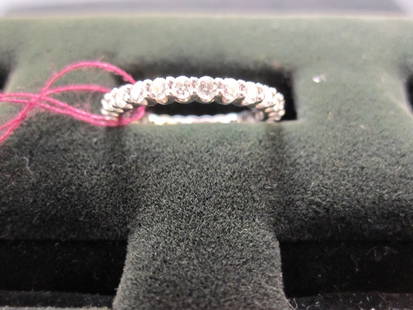 LADIES PLATINUM AND DIAMOND BAND - TOTAL DIAMOND: WEIGHT IS 1.5 cts (NOTE: THIS LOT IS PART OF AN ASSIGNMENT FOR THE BENEFIT OF CREDITORS CASE OR RECEIVERSHIP CASE. THE HIGH BID WILL REQUIRE APPROVAL OF SALE BY THE ASSIGNEE OR RECEIVER. AUCTION IS NO