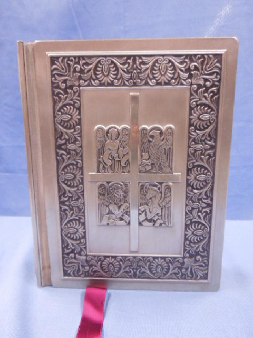 Franklin Mint Silver Family Bible: 1975 Franklin Mint Catholic Version Silver Family Bible with an ornate sculptured sterling silver cover that contains over a pound of silver. The Bible itself contains over 1250 pages & has 40 illustr