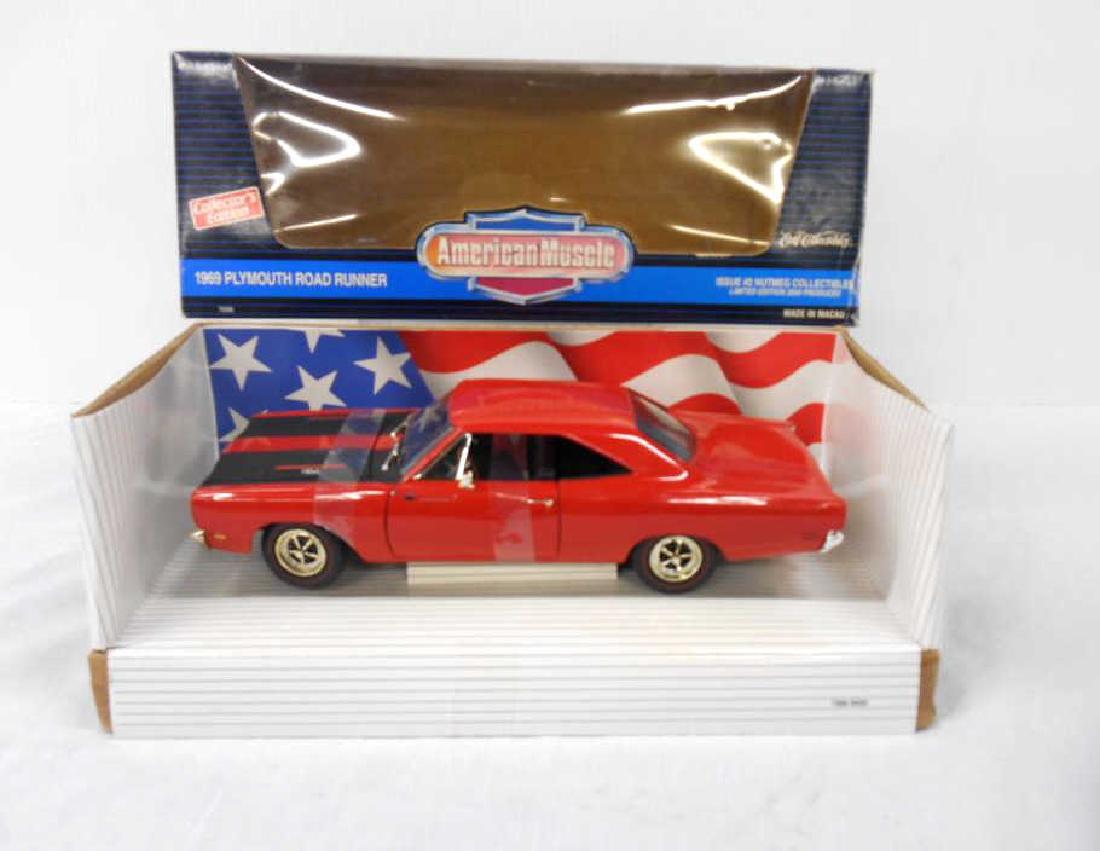 Ertl American Muscle Plymouth Road Runner: The Ertl Company Inc. American Muscle Collector's Edition 1:18 scale die cast metal 1969 Plymouth Road Runner, limited edition of 2500 produced, issue # 2 Nutmeg Collectibles, with its original box. C