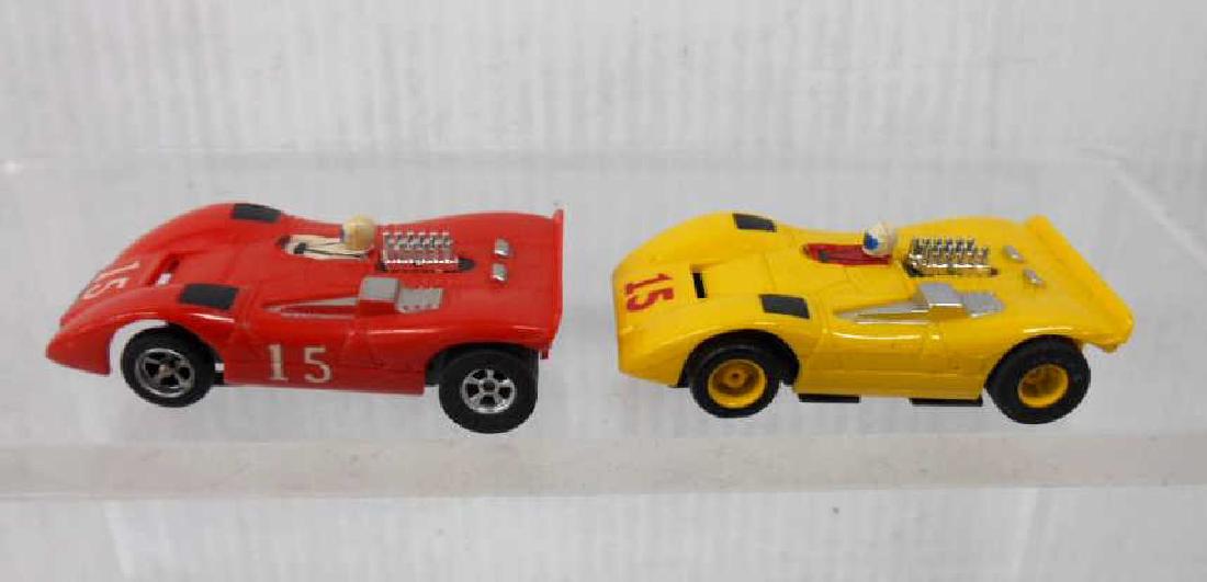 Tyco Aurora AFX Ferrari Slot Cars: Two Tyco Aurora AFX Ferrari 512 slot cars. CONDITION: Both are in good condition with minor wear. Both have been tested & work.
