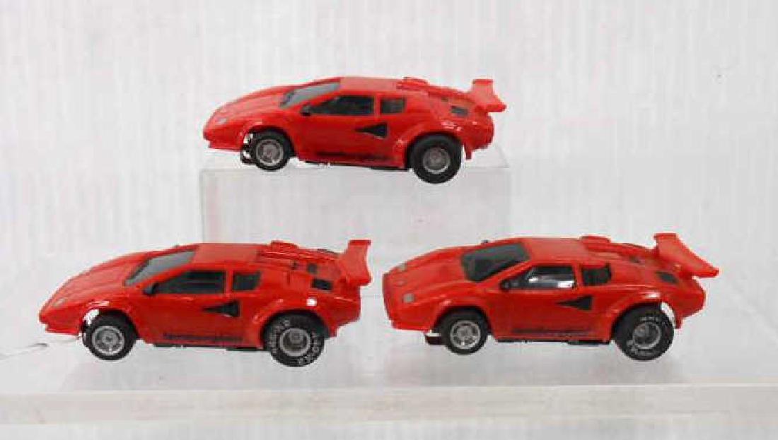 Tyco AFX Lamborghini Slot Cars: Three assorted Tyco AFX Lamborghini slot cars. CONDITION: Untested fair/used condition with minor wear.