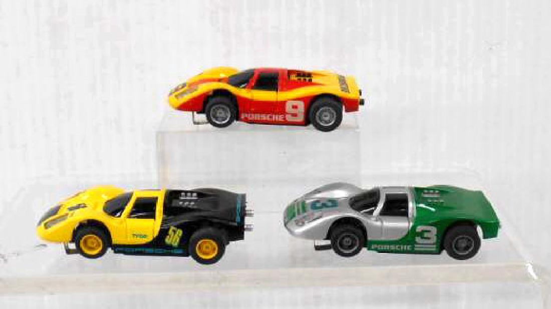Tyco AFX Porsche Slot Cars: Three assorted Tyco AFX Porsche slot cars includes: #9, #3 & #56. CONDITION: Untested very good condition with minor wear.
