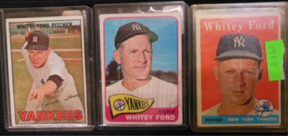 3 Topps Whitey Ford Baseball Cards: (3) Topps Whitey Ford Baseball Cards including: 1958, #320, 1965, #330 and 1967, #5, all in plastic sleeves. CONDITION: Good, edges may have minor wear.