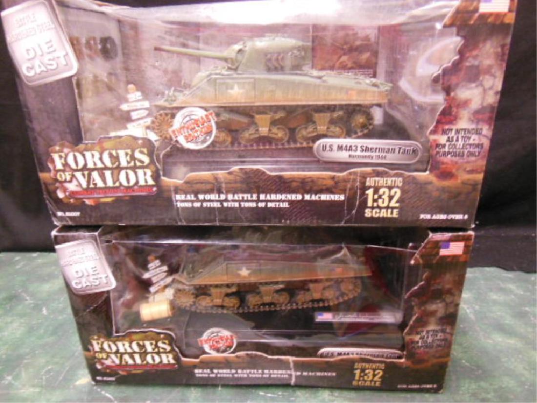 2 Forces of Valor US Tanks: 2 Forces of Valor US Tanks, M4A3 Sherman tanks, 3rd Armored Division, Normandy, 1944, each with figure (both loose in box) information card and accessories, both 1:32 scale die cast, new in original b