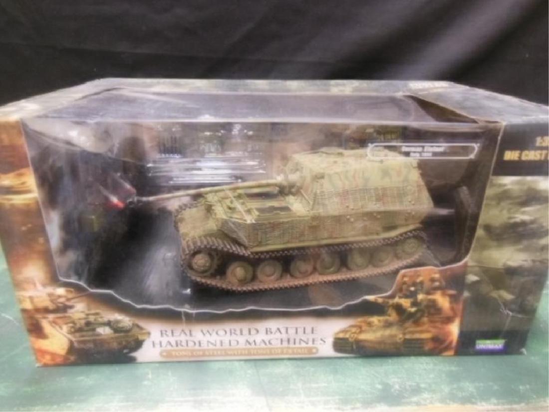Forces of Valor Die cast Tank: Forces of Valor Die cast Tank, German Elefont, Italy 1944, with accessories and information card, new in original box 1:32 scale diecast metal, 7" x 8" x 14" = box. CONDITION: Box has some wear.