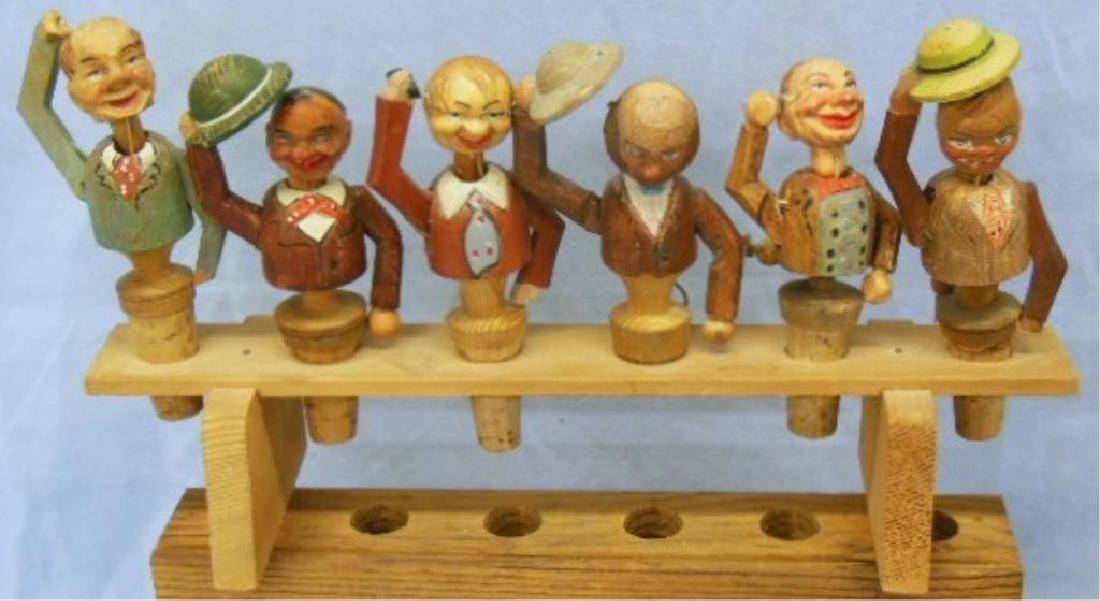 6 Carved Mechanical Figural Stoppers (1 of 8)