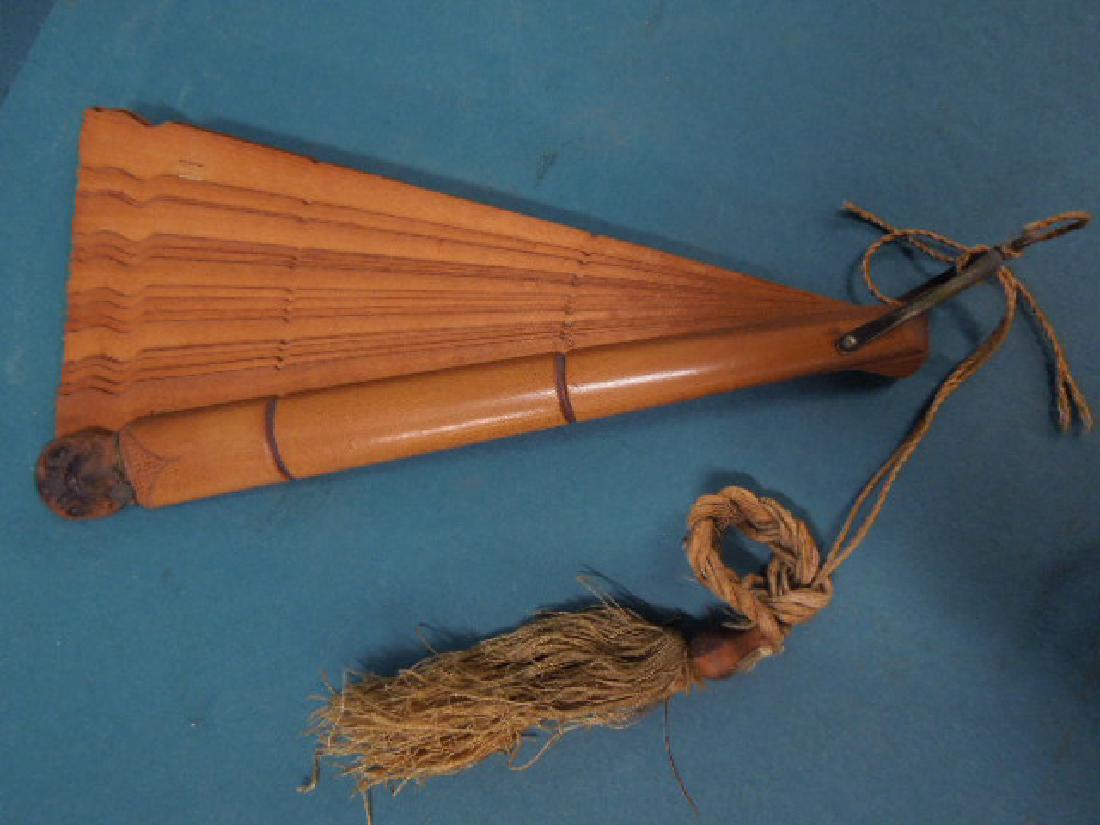 Bull Dog Carved Hand Fan: Bull Dog Carved Hand Fan, with glass eyes, brass collar and a brass round tag with engraved dog head on both sides of fan, brass ring handle at base, 19th / 20th C., 10 1/2" l. CONDITION: Very good, m