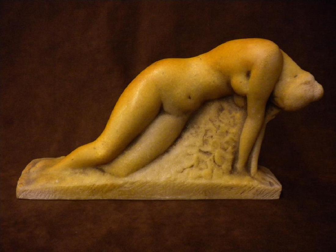 Vincent Glinsky Sculpture: Vincent Glinsky signed 7" (h) x 11 1/2" (l) x 2" (w) resin sculpture, depicting a reclining nude female. CONDITION: Very good condition with no damage, dirt residue in finish.